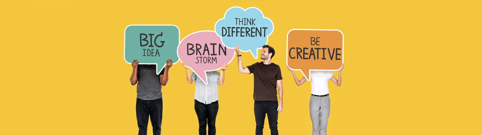 Four people holding speech bubbles reading Big Idea, Brainstorm, Think Different and Be Creative against a yellow background