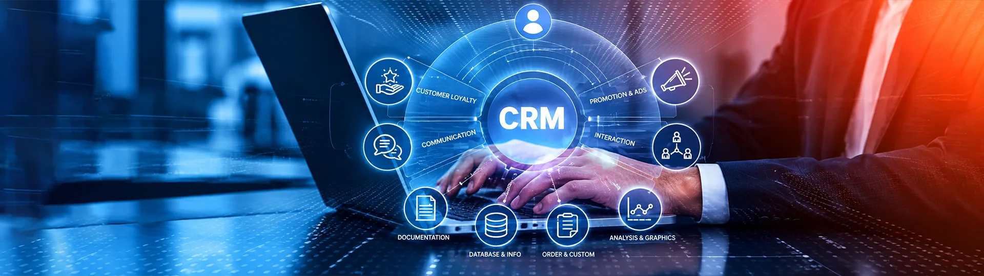 Businessman typing on a laptop beneath a glowing CRM wheel of customer loyalty, communication, interaction, database and analysis icons